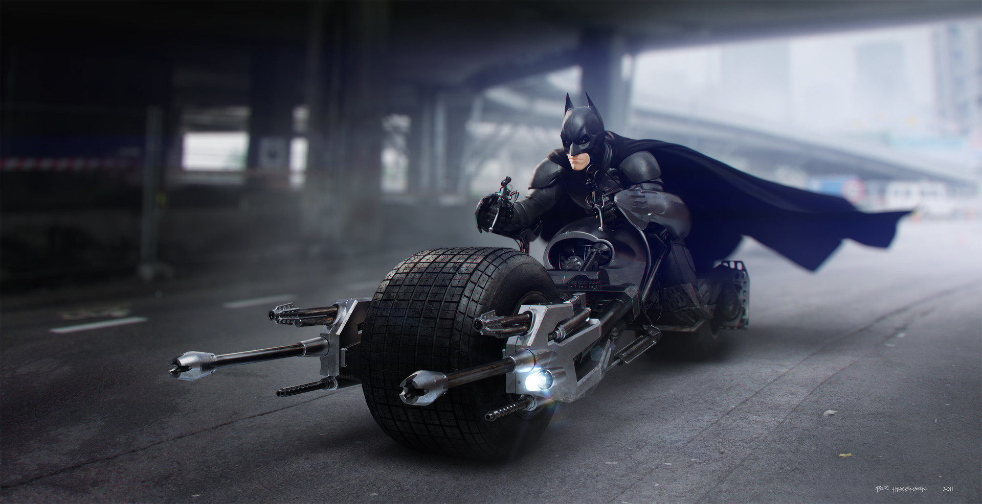 Batman riding the Batpod beneath an urban overpass